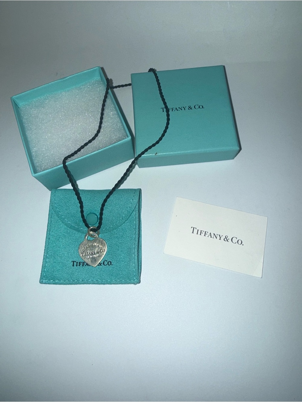 Tiffany & Co. Silver Heart Tag Pendant on Black Cord